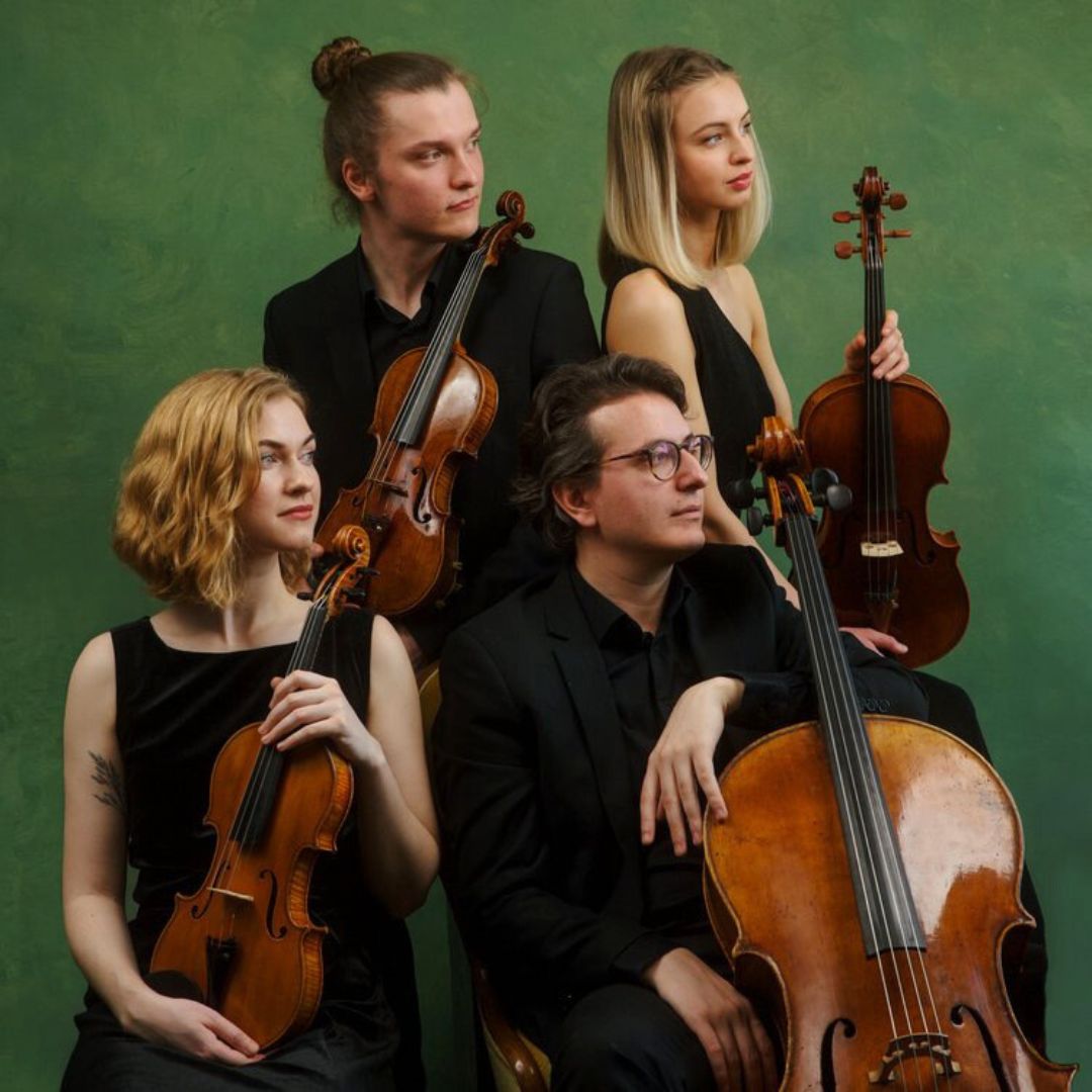 a quartet of musician on a green bcakground